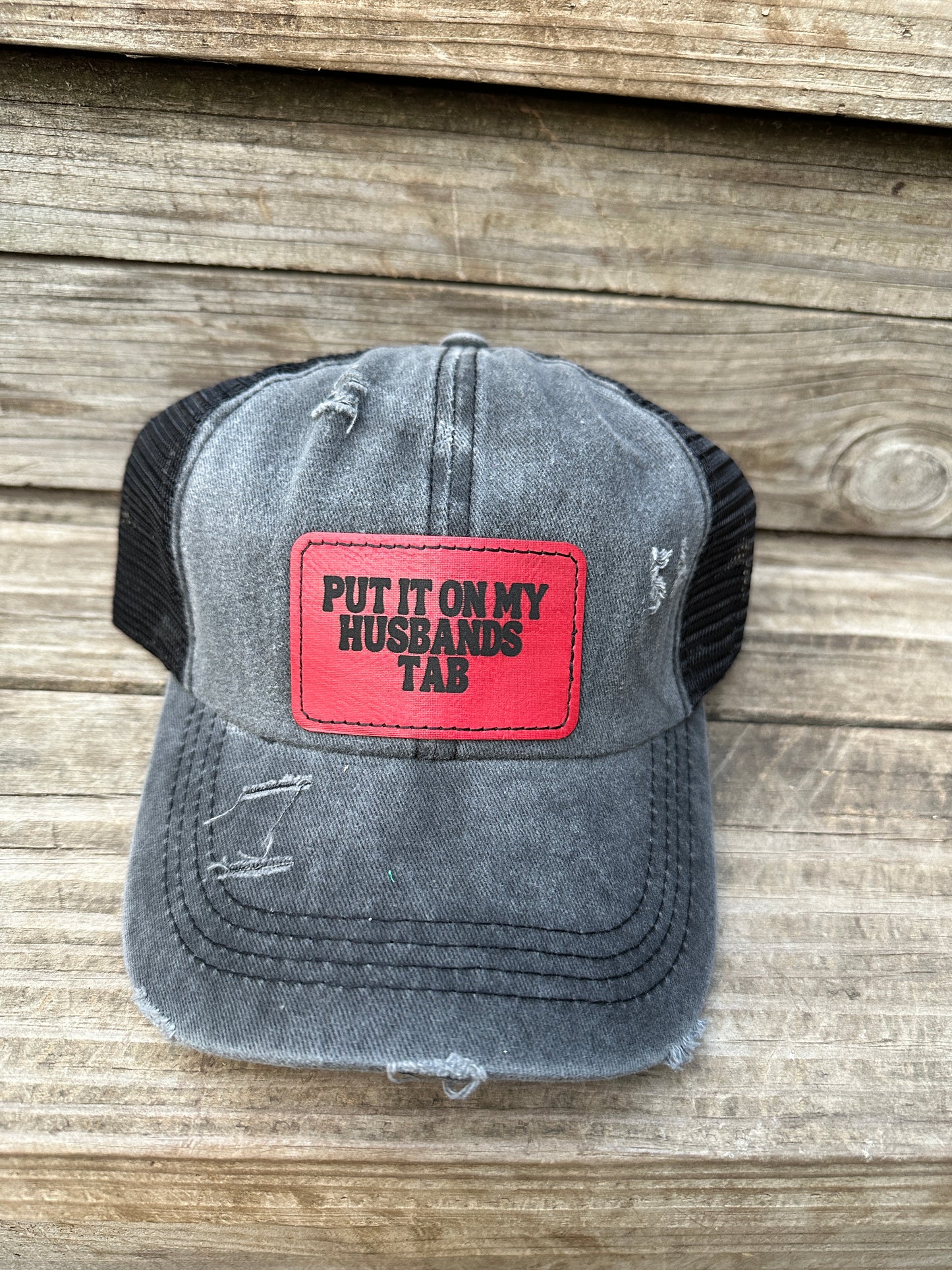 Put It On My Husband's Tab Women's Criss Cross Hat