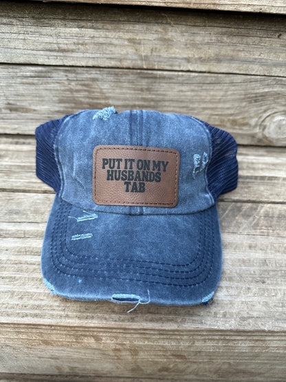 Put It On My Husband's Tab Women's Criss Cross Hat